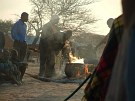 funeral: men cooking at the holy fire